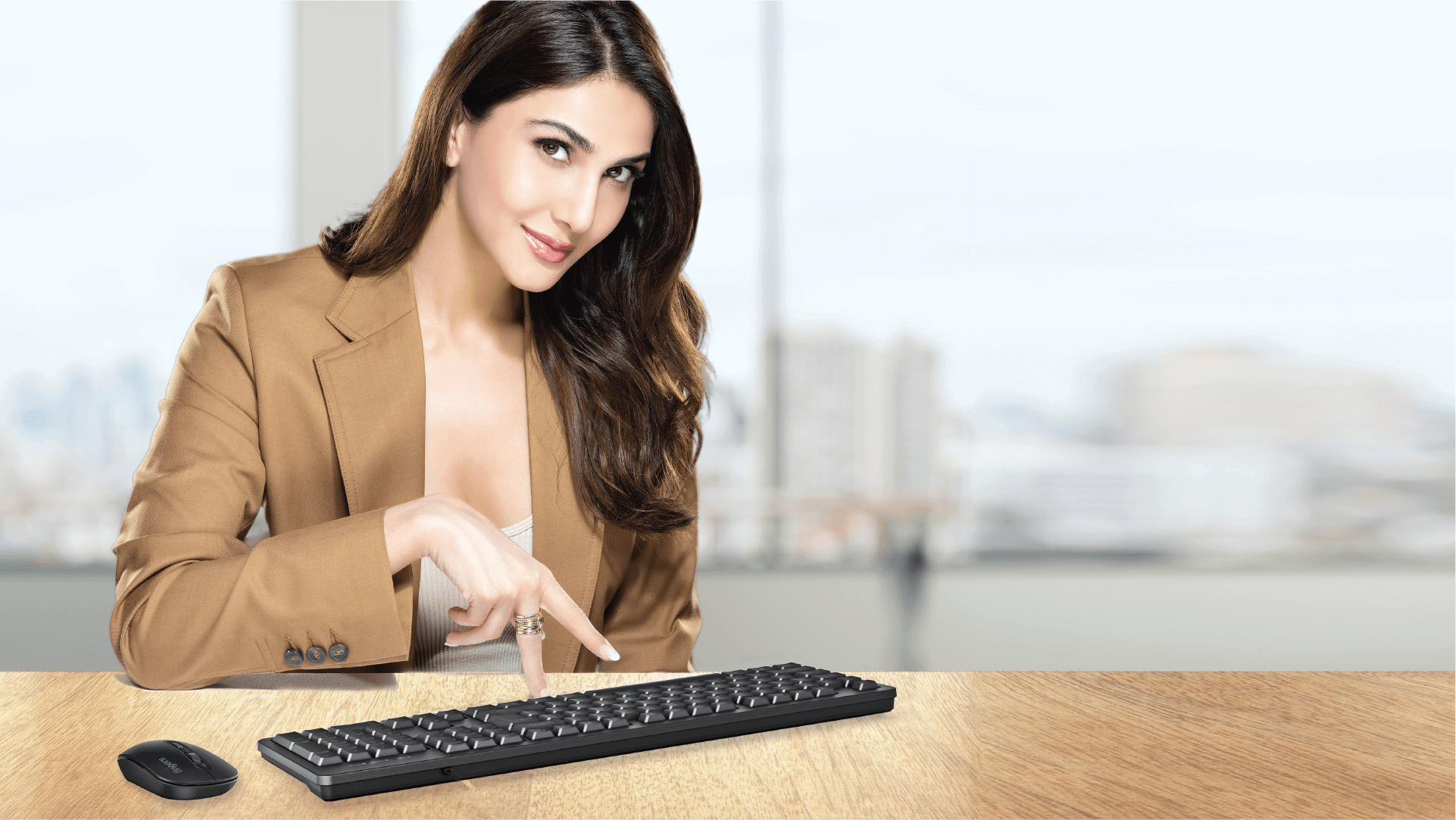 FINGERS StellarCombo Wireless Deskset Kept On A Desk And Being Operated By Bollywood Star Vaani Kapoor